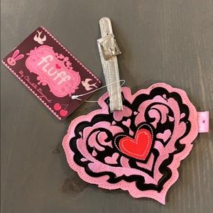 Fluff pink embroidered brand new luggage tag.